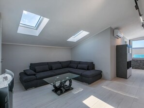 Furniture, Wood, Interior Design, Flooring, Kitchen, Cabinetry, Floor, Room, Major Appliance, Cupboard