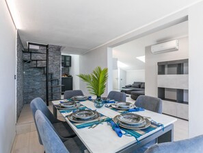 Furniture, Wood, Interior Design, Flooring, Kitchen, Cabinetry, Floor, Room, Major Appliance, Cupboard