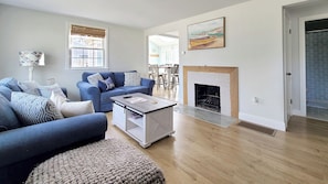 Living room with comfortable seating and flat screen TV