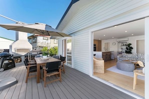 Spacious deck with outdoor fireplace