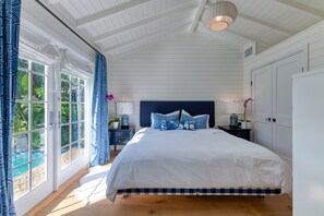 5 Star Master en-suite with king Hastens bed, custom blackout shades, luxury linens, French doors to pool, vaulted ceilings, 55 inch TV, en-suite master bath