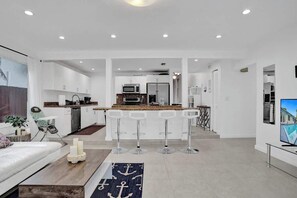 Eat together at the stylish dining table with seating for six 