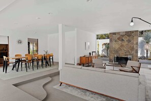 Curl up in the chic living room & stream your favorites on the smart TV