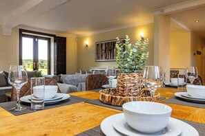 Set the scene, our dining table is perfect for intimate meals, set with style and warmth