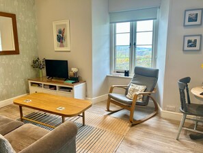 Bright and airy lounge, sit back with a cup of tea and watch the wildlife from your window. 