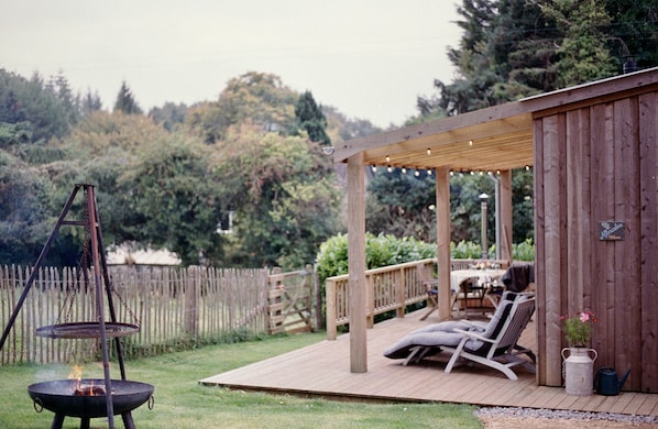 Light the fire pit and cook up a BBQ feast in your private garden