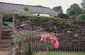 Sympathetically converted stone sheep yards make a peaceful garden