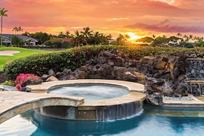 Soak in the spa as the sun dips low, painting the sky with vibrant colors.