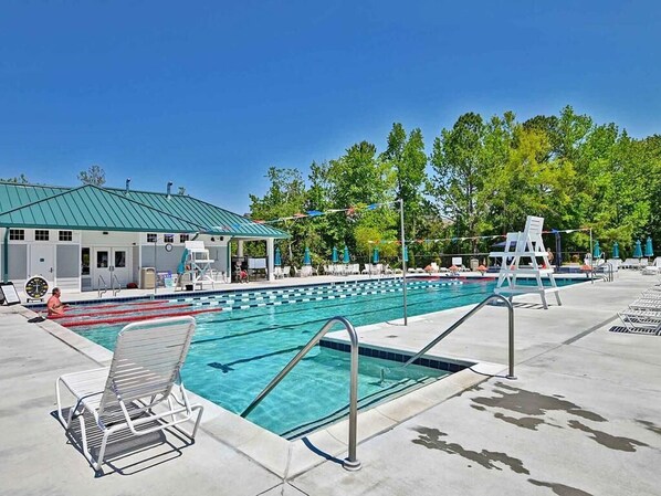 Take a refreshing dip in the community's large outdoor pool, ideal for both relaxation and swimming laps.
