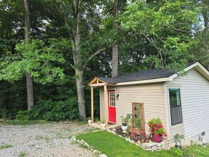 The cottage with the vast woods on the east side