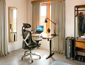 Sit-stand desk and ergonomic chair for optimal comfort