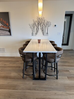 Dining area with quartz top that seats 7 comfortably