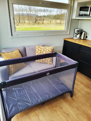 A travel cot available for free.