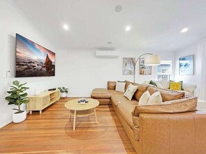 The spacious living area provides plenty of space for the whole family. 