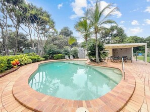 Take a refreshing dip in one of the building's three pools.