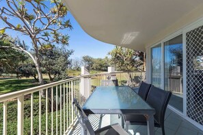 Step outside onto the spacious wrap-around deck, where you can dine alfresco, lounge in the sun, or simply enjoy views of the pool, park, and sparkling water.