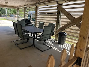 Outside covered patio, great space for enjoying crabs or just grilling out