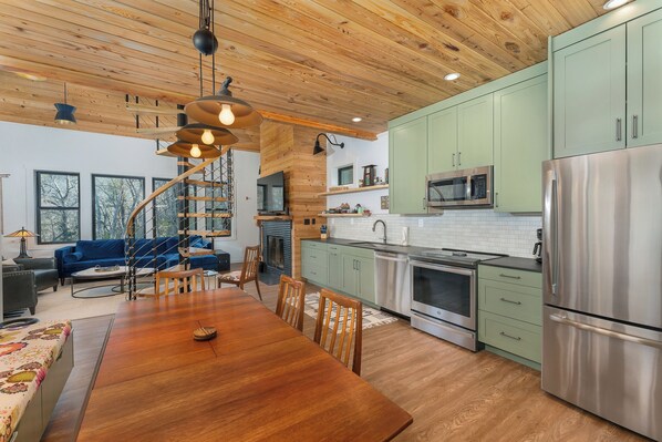 Open-concept kitchen with dishwasher and drip-style coffee maker