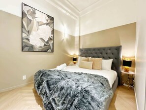 Experience comfort and luxury in this bedroom. Unwind on a plush, comfortable queen-sized bed adorned with luxurious pillows, ensuring a restful night's sleep. Anti- dust mite mattress and pillow protectors. 