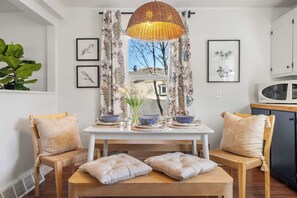 Dining table with seating for 6 for family meals.