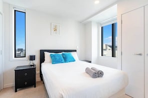 Bedroom 1, Queen bed, En-suite bathroom, Nightstand, wardrobe.