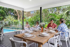 Enjoy alfresco dining and relaxed evenings on the covered outdoor deck.