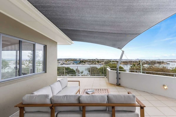 Head up to the rooftop terrace to unwind with panoramic views stretching across the coastline.