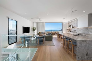 Come home to space and comfort with an open-plan living complemented by floor-to-ceiling views and stylish furnishings. This three storey home has the added feature of a lift as well to access each floor.