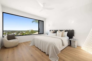 Wake to breathtaking views from the spacious king suite with plush bedding.