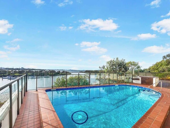 A shimmering pool with a stunning view, ideal for a refreshing afternoon dip.