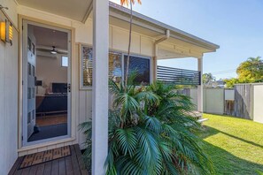 Welcoming and elevated just two steps from ground level, the front entry sets the tone for your peaceful beach retreat.

