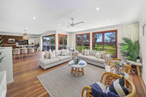 A spacious, open flow encourages togetherness with the ocean as your backdrop.