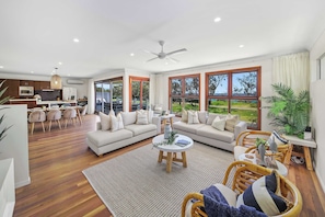 A spacious, open flow encourages togetherness with the ocean as your backdrop.