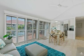 Enjoy easy flow and relaxed vibes in the open-plan living and dining area.
