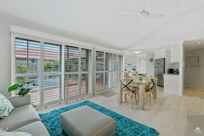 Enjoy easy flow and relaxed vibes in the open-plan living and dining area.