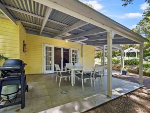 Enjoy alfresco dining with BBQ facilities and peaceful garden views.