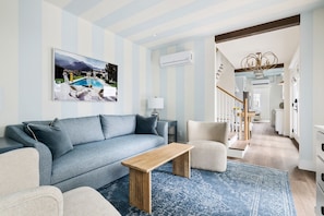 Living area . Comfortable seating for family gatherings.