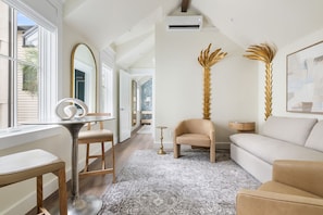 Feel at home with a bedroom and cozy lounge.