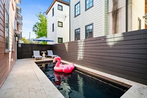 Step into vacation mode with a poolside dip.