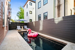 Step into vacation mode with a poolside dip.