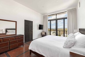 Master Bedroom featuring a King Size Bed, Walk-In Closet and En-Suite Bathroom