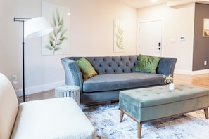 Experience the perfect blend of style and comfort in our living room, with its colorful vibe that adds a lively touch to your stay. #StylishComfort