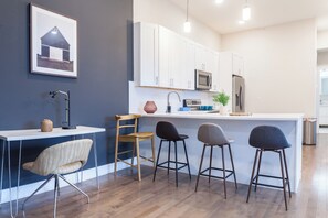 Enjoy a dedicated work area with a stylish desk, providing a comfortable and conducive environment for focused work and creativity #WorkspaceElegance #ComfortableWorkspace
