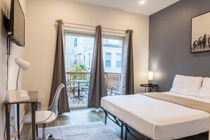 Experience modern elegance in our carefully curated bedroom. The tasteful decor, paired with soft lighting, creates a serene atmosphere for a restful night's sleep #BedroomComfort #UnwindAndRestore #SereneSpace 