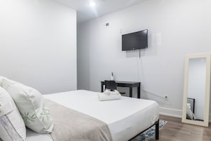 Dive into comfort in our luxury bedrooms with queen-sized beds.