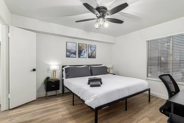 Step into comfort and tranquility. This cozy bedroom offers a plush bed, soft linens, and a serene ambiance — perfect for unwinding after a long day of adventure. Your perfect sleep sanctuary awaits.