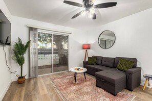 A space to connect, relax, and recharge. Whether you're lounging on the sofa with a good show or having late-night laughs with friends, this living room sets the mood with style and comfort.