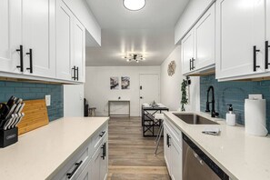 Fully equipped for your inner chef! From morning coffee to midnight snacks, this modern kitchen features all the essentials — cookware, utensils, and appliances — to make every meal a masterpiece.