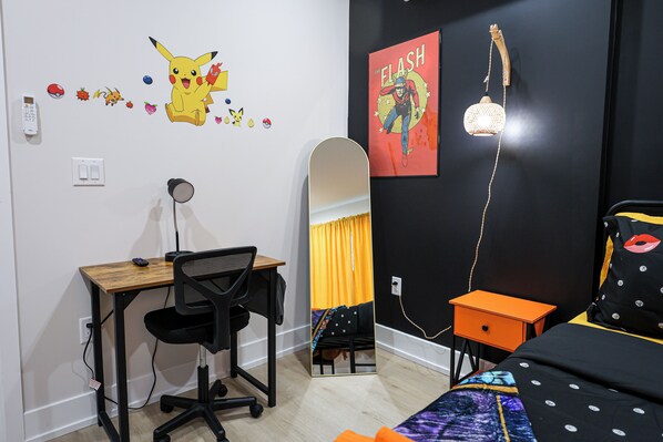 A quiet and functional study nook, perfect for remote work or focused reading. Equipped with a desk, chair, and ample lighting to keep you comfortable and productive.