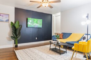 Discover the perfect haven for relaxation in our spacious living room, where you can stretch out, unwind, and let go of the day's stresses.